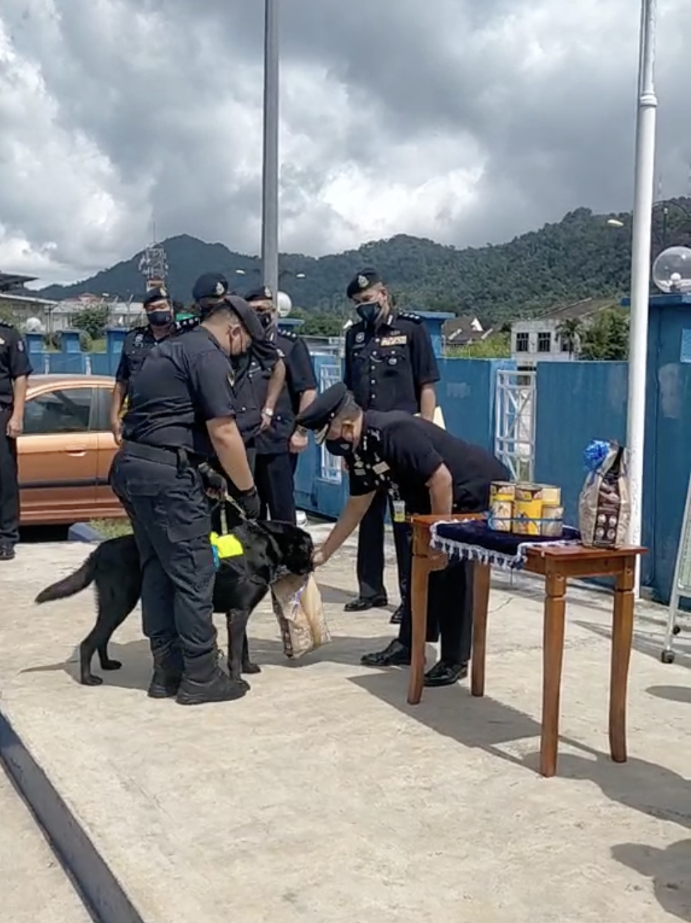 PDRM officer giving Black his award